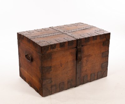 Lot 818 - An iron-bound oak silver chest, with hinged...