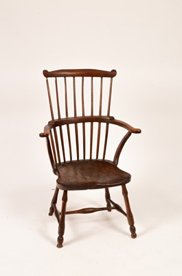 Lot 824 - A 19th Century ash and elm comb back chair,...