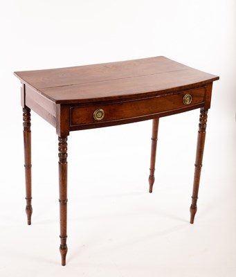 Lot 827 - A Regency mahogany bowfront side table, fitted...