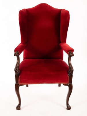 Lot 843 - A 19th Century carved framed wingback armchair