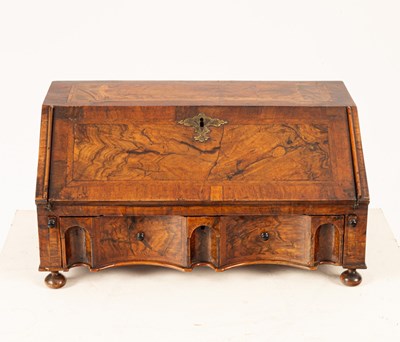 Lot 868 - A Queen Anne walnut dressing table bureau,...