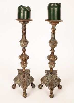 Lot 880 - A pair of brass pricket candlesticks, knopped...