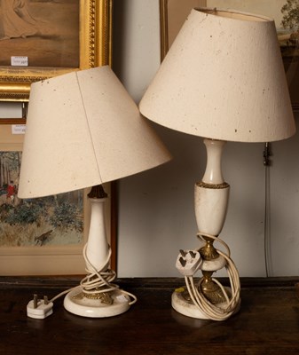 Lot 886 - Two marble and brass lamps, one of urn form,...