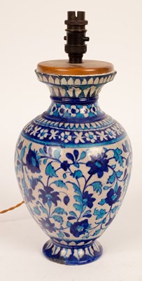 Lot 891 - An Iznik style table lamp, 40cm high