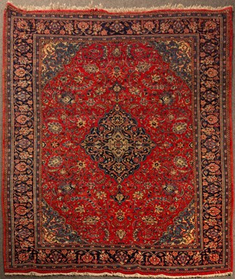 Lot 907 - A Sarouk carpet, West Persia, the madder field...