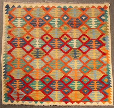 Lot 908 - An Anatolian Kilim, with a polychrome field of...