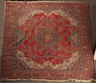 Lot 918 - A Tabriz carpet, North West Persia, the madder...