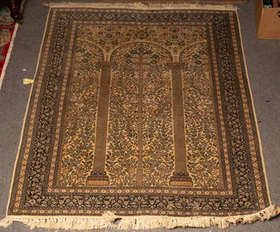 Lot 919 - A Nain prayer rug, the ivory field of arched...