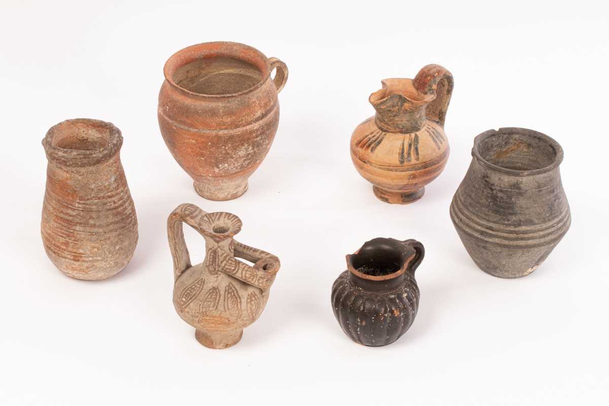 Lot 7 - A selection of Greek and Roman pottery,...