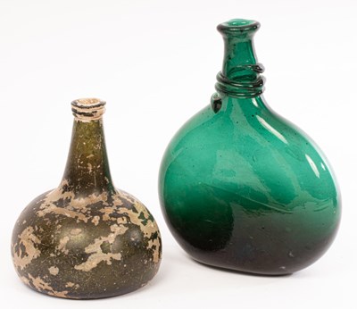 Lot 28 - An 'onion' wine bottle, early 18th Century,...