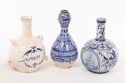 Lot 73 - Three tin-glazed bottles, 17th Century and...