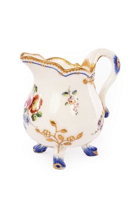 Lot 151 - A Sèvres cream jug (pot a lait a trois pieds),...