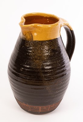 Lot 224 - Malcolm Darling (1947-2022), a slipware jug,...