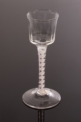 Lot 302 - An 18th Century wine glass, the ogee bowl with...