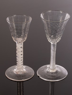 Lot 303 - Two 18th Century wine glasses, each with...