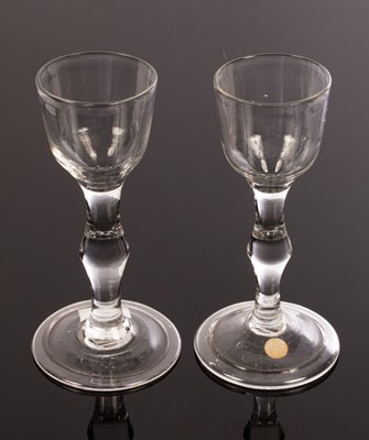 Lot 308 - Two 18th Century wine glasses, with ogee bowl...