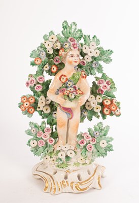 Lot 367 - A Bow figure of a cherub with flower basket...