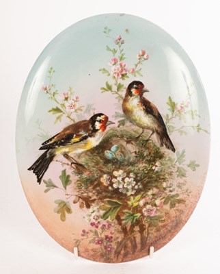 Lot 433 - An oval porcelain plaque painted finches,...