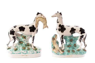 Lot 439 - A pair of Staffordshire Disraeli greyhounds,...