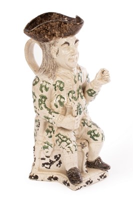 Lot 440 - A Squire style Toby jug, circa 1900, sponged...