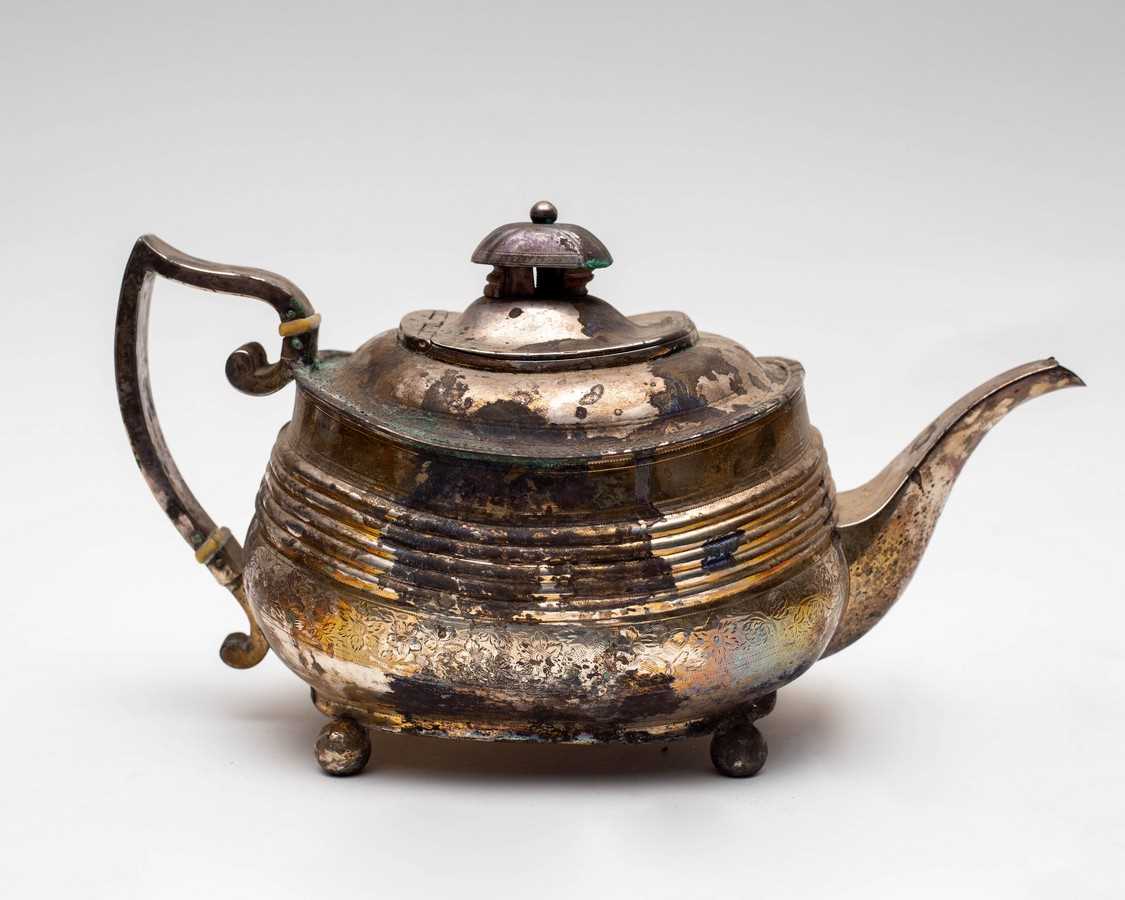 Lot 8 - A 19th Century silver teapot, makers marks...