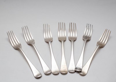 Lot 19 - A matched set of seven silver forks, various...