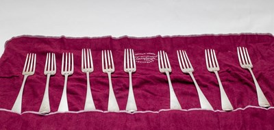 Lot 20 - A matched set of ten silver forks, various...