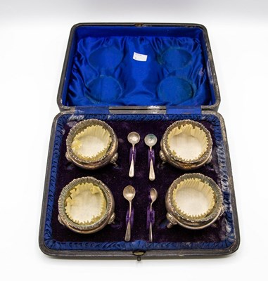 Lot 51 - A cased set of four silver salts with spoons,...