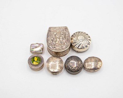 Lot 57 - Seven silver pill boxes, including a...