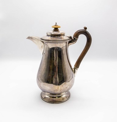 Lot 69 - A George IV silver hot water jug, BS, London...