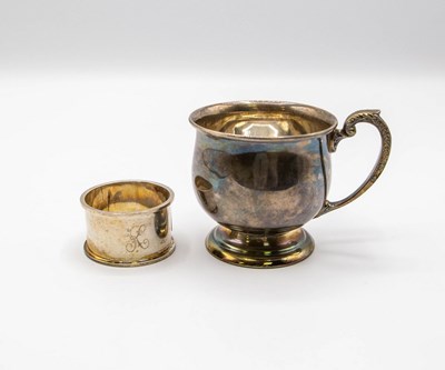 Lot 74 - A silver cup, Birmingham 1930, with C-scroll...