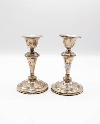 Lot 104 - A pair of Edwardian silver mounted...