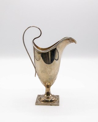 Lot 108 - A silver cream jug, Henry Williamson Ltd.,...