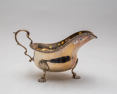 Lot 126 - A George V silver sauce boat, Edward Barnard &...