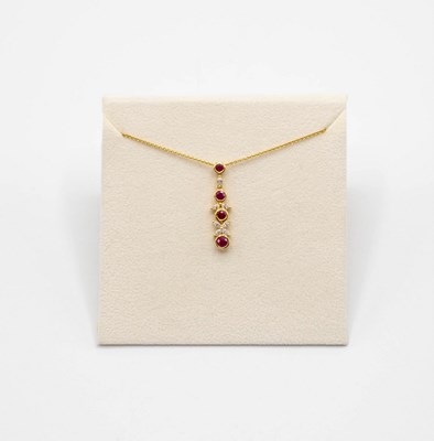 Lot 207 - A contemporary ruby and diamond 18ct gold...