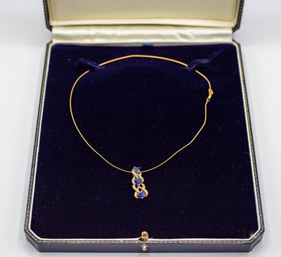 Lot 208 - A contemporary synthetic sapphire and diamond...