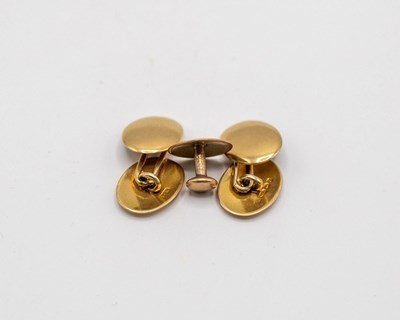 Lot 222 - A pair of 15ct gold cufflinks and a 15ct gold...