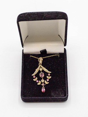 Lot 225 - An Edwardian ruby and pearl pendant necklace,...