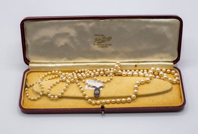 Lot 226 - A two row cultured pearl necklace with oval...