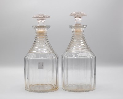 Lot 260 - A pair of decanters and stoppers with step-cut...