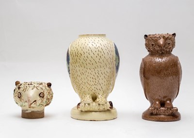 Lot 341 - Two earthenware vessels in the form of owls,...