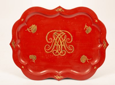 Lot 422 - A red and gold lacquer tray with a central...