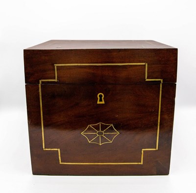 Lot 438 - A flame mahogany decanter box with brass inlay,...