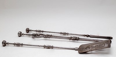 Lot 448 - A set of three burnished steel fire irons, the...