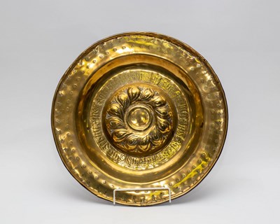 Lot 454 - A Nuremberg brass alms dish, late 16th Century,...