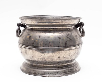 Lot 457 - A pewter two-handled chamber pot, 17th Century,...