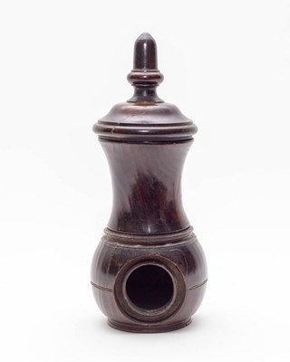 Lot 461 - A treen lignum vitae coffee grinder, 19th...