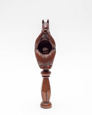 Lot 462 - A Victorian turned wooden squirrel nutcracker,...