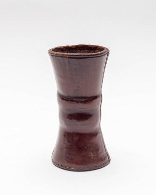 Lot 466 - A leather dice shaker, 19th Century, waisted...