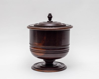 Lot 474 - A lignum vitae wassail bowl and cover, 17th...